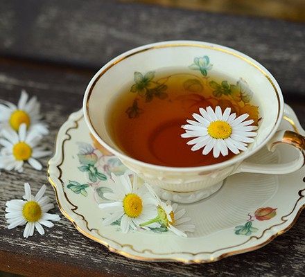 Close Up Of Herbal Tea On Table